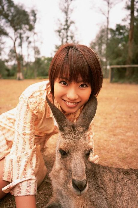 Captivating asian beauty with deliciously plump breasts in bikini