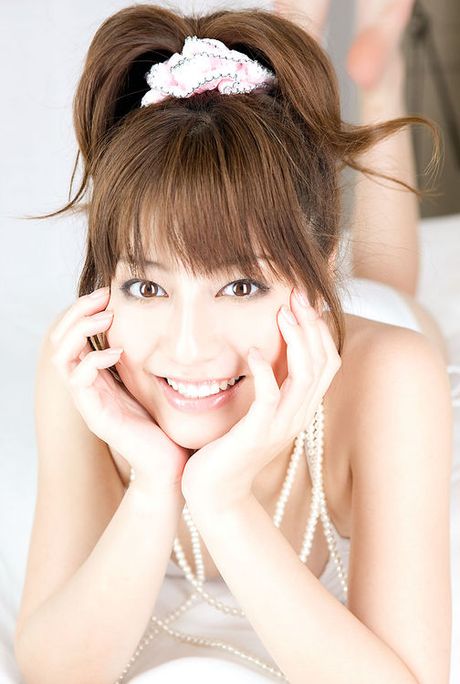 Arousing asian beauty with gorgeous milky white skin in a bikini