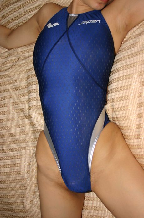 Asian amateur teen with small tits strips and shows her ass and pussy