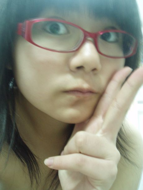 fat teen poses in the mirror with small tits