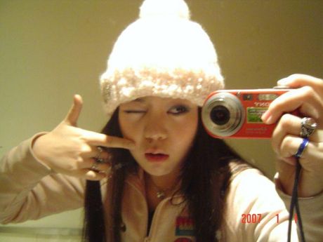 crazy but sweet cutie strips out of winter clothes in the mirror