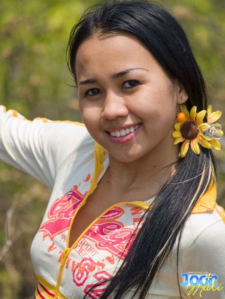 Sweet Joon Mali lifts her skirt and flashes panties outside