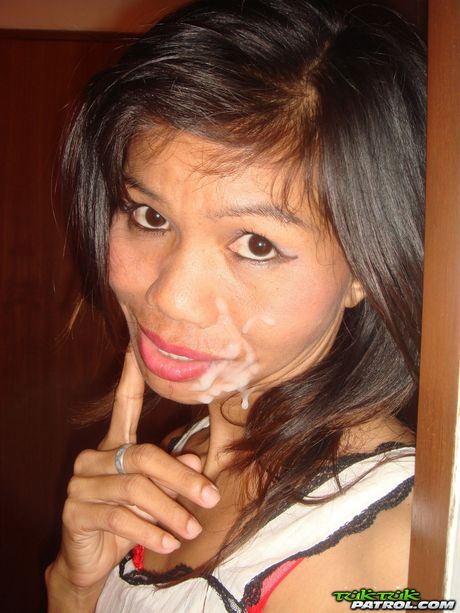 Skinny Asian teen Apple strips and shows her tiny tits and pink pussy