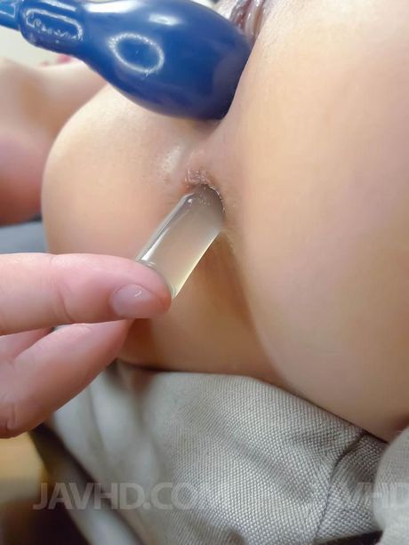 Mafuyu Hanasaki Asian with legs in tapes gets vibrators in holes