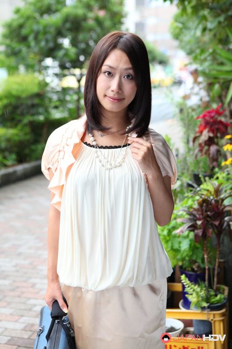 Stunning Japanese cutie Yayoi Yanagida in a sexy dress shows her body