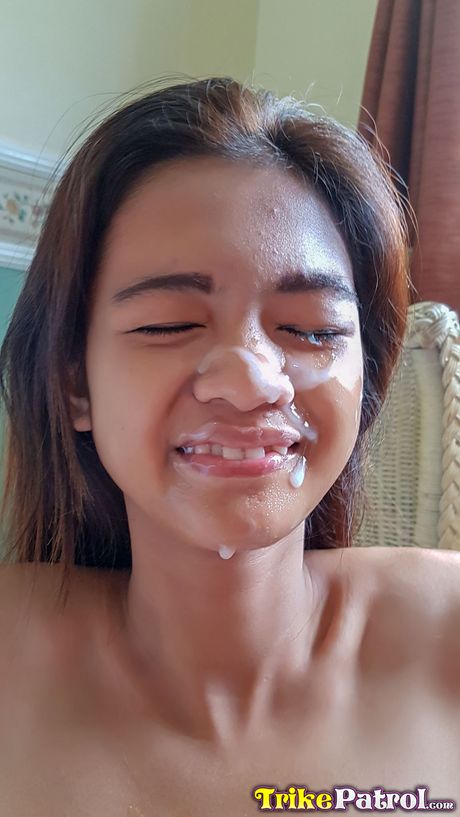 Skinny Asian teen Lyka strips and shows her hairy pussy up close